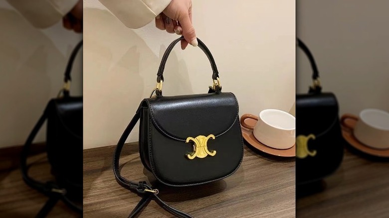 Black leather crescent handbag