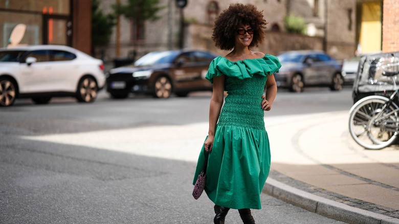 woman wearing green flowy dress