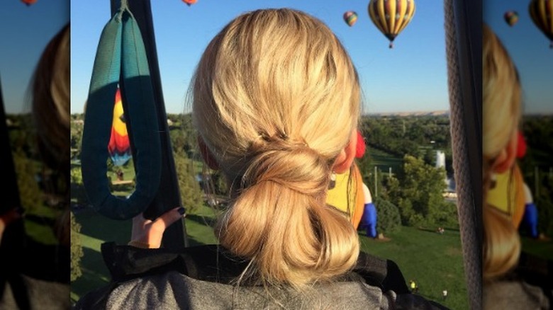 Messy blond looped bun