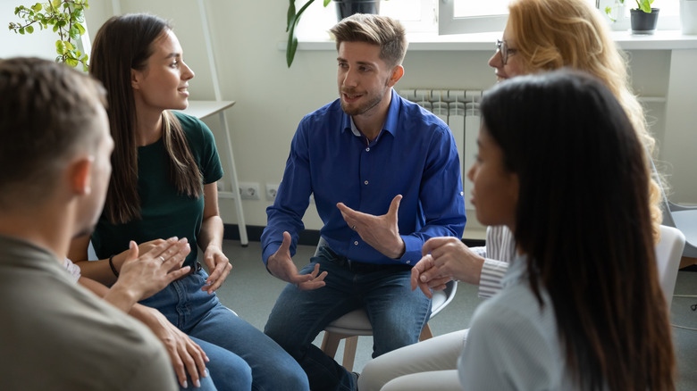 A group of people talking