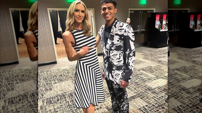 Lara Trump while in a black-and-white striped dress pointing