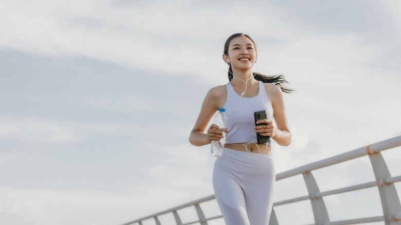 Woman smiling while running