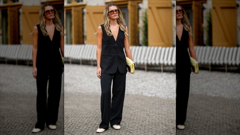 woman wearing black tuxedo top