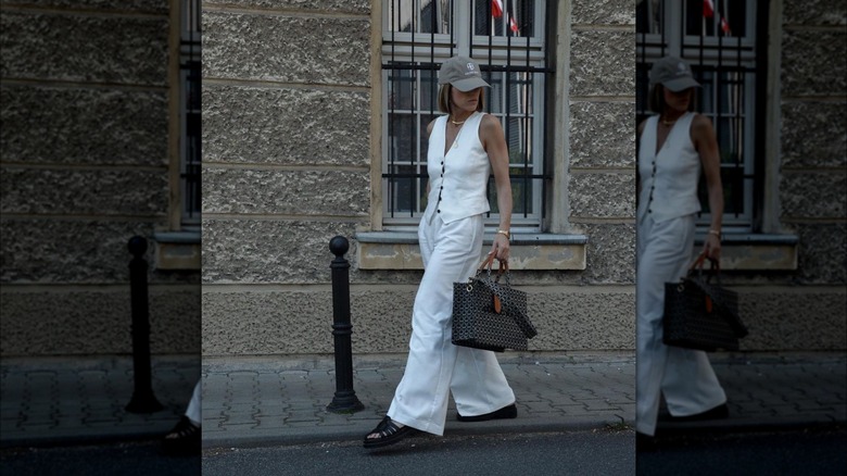 woman wearing white tuxedo top