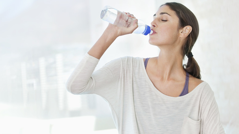 woman drinking water