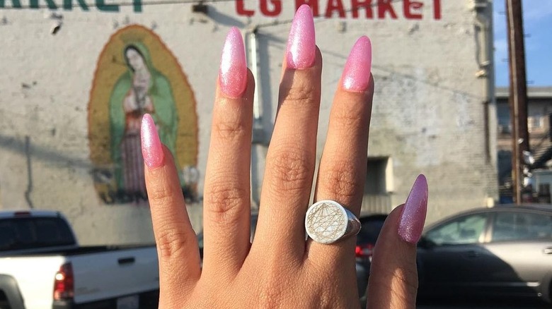 pink shimmery almond shape manicure