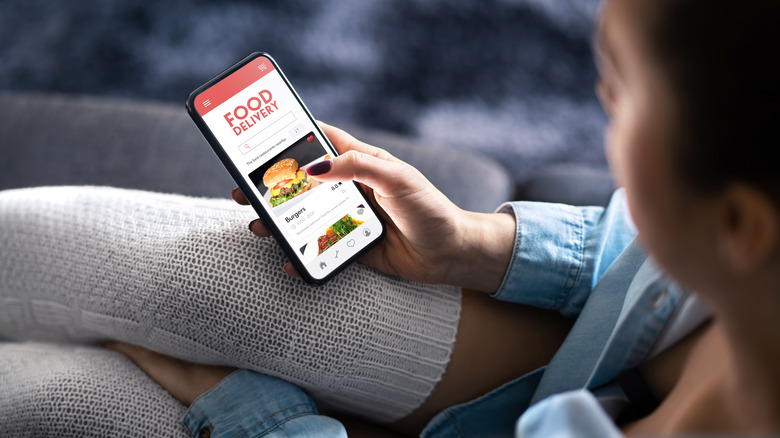 Woman ordering food via app