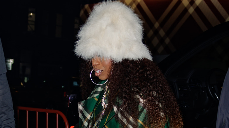 Missy Elliot wearing faux fur hat