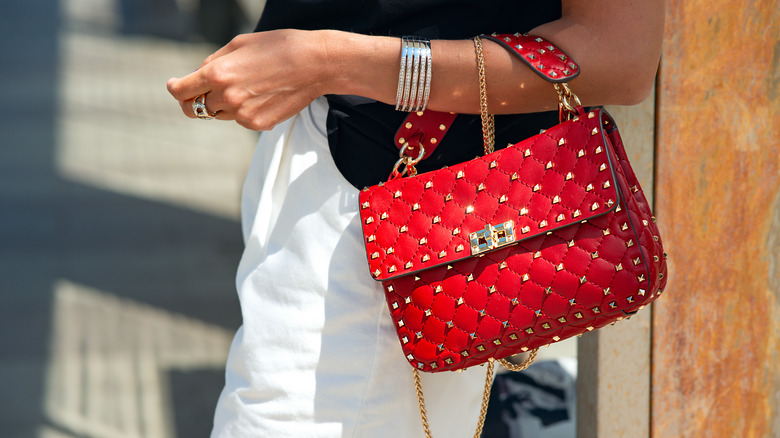 red studded purse