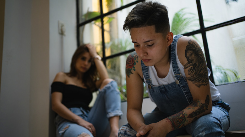 sitting couple during conflict