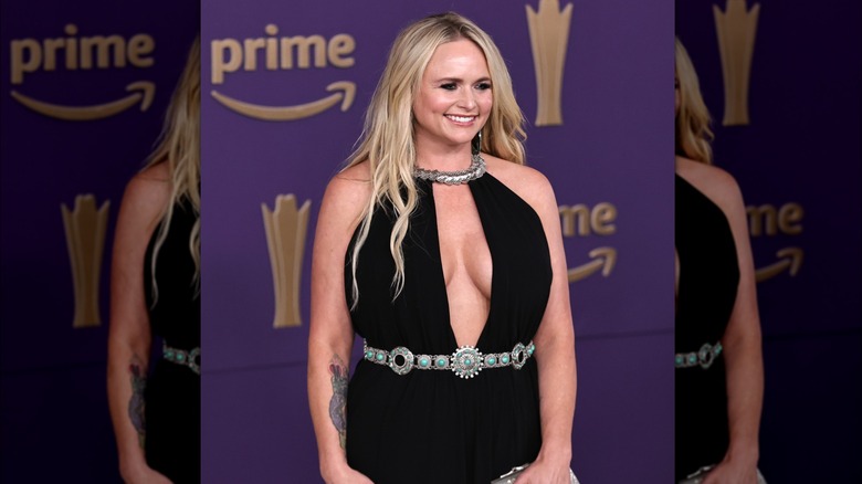 Miranda Lambert black dress turquoise belt