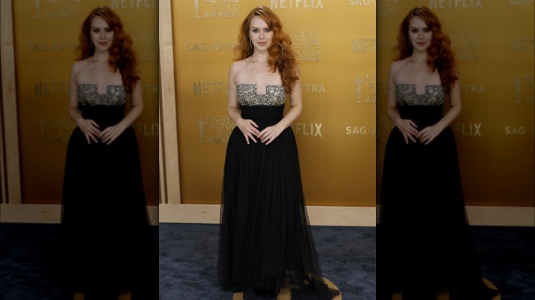 Elizabeth McLaughlin wearing a black-and-silver dress at the 2025 SAG Awards