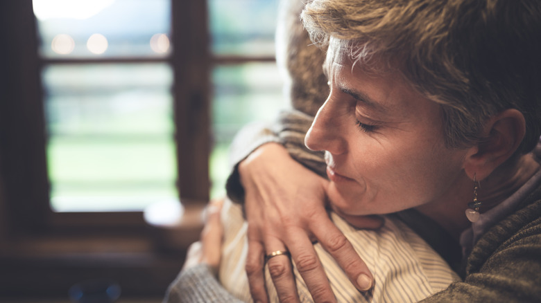 Two people hugging