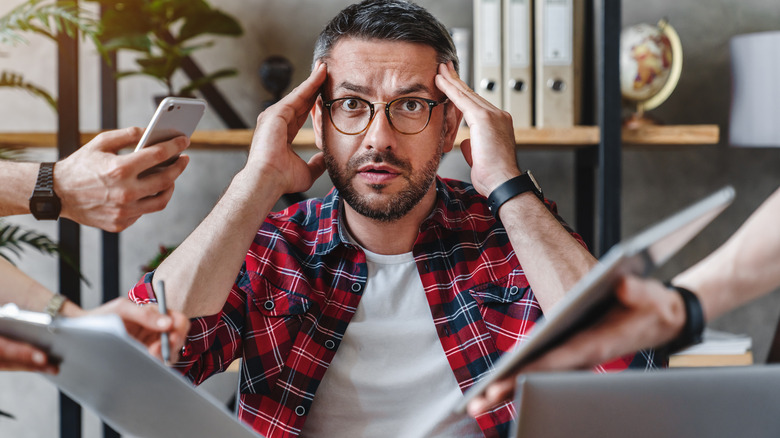 Man appearing stressed out