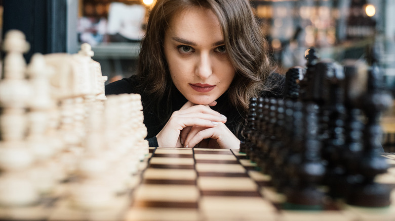 Woman playing chess