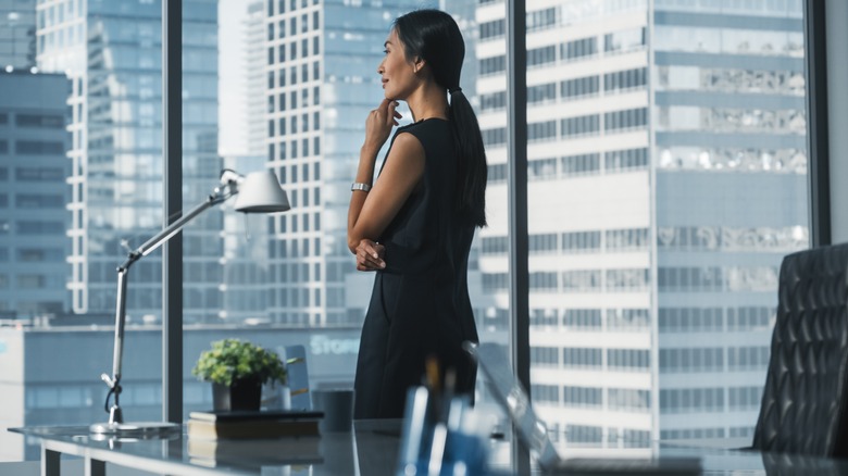 Woman looking out of window 