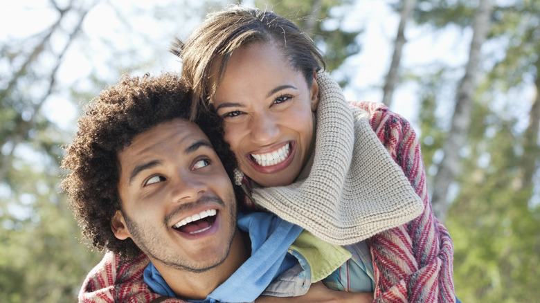 Happy Black couple outdoors 