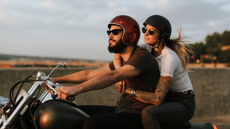 Couple riding a motorcycle 