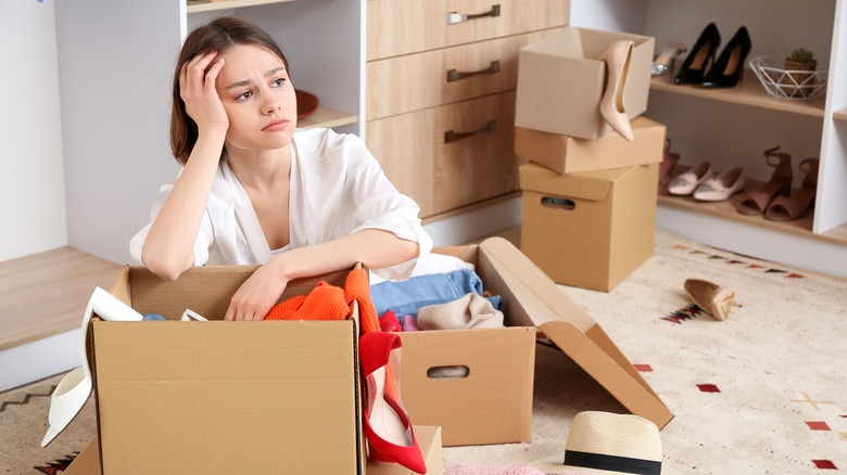 woman unpacking boxes