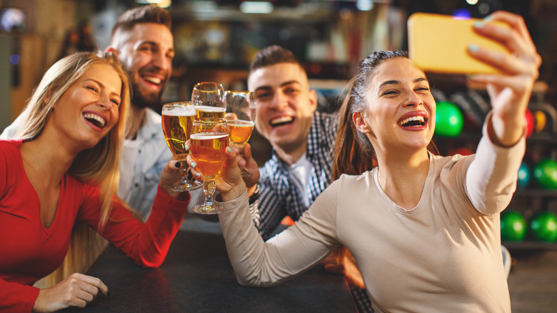 Friends selfie with beer