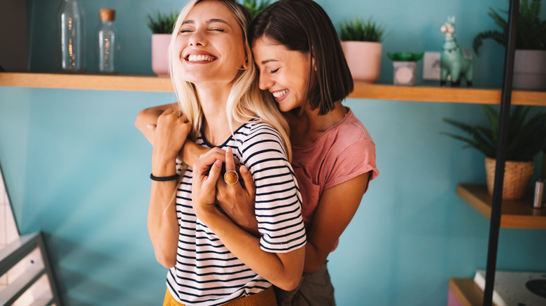 Two women hugging