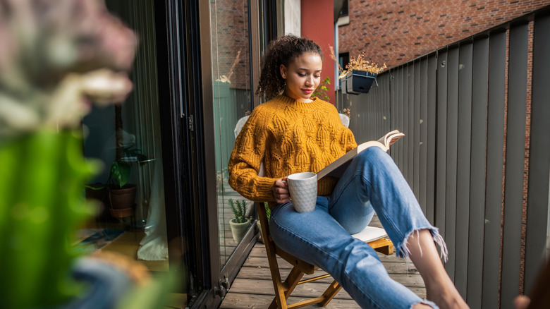 Woman reading outside