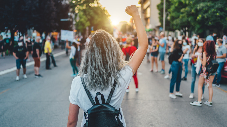 Rebellious person at protest