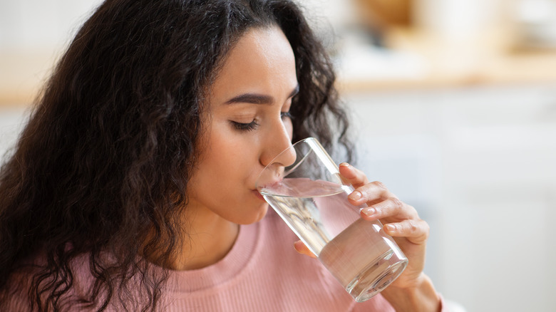 Woman drinking glass of water 