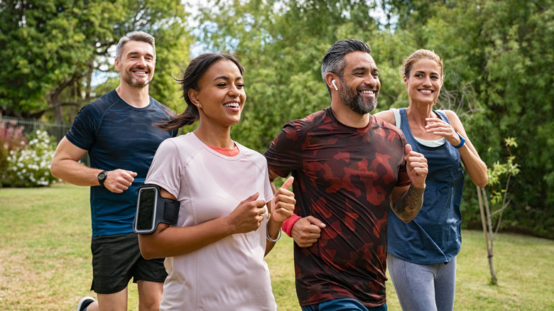 group of people happily running