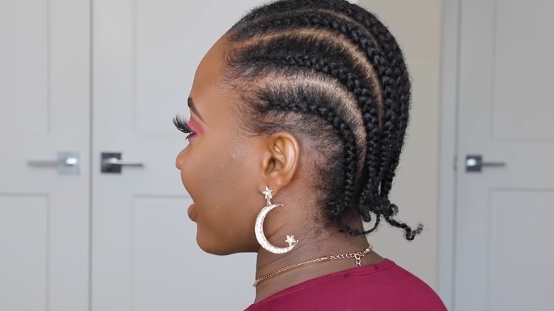 woman with cornrows in short hair
