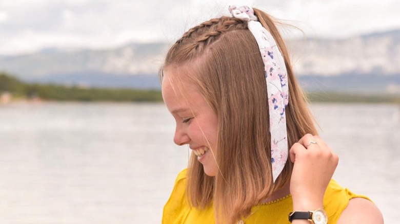 woman with short hair in dutch braids