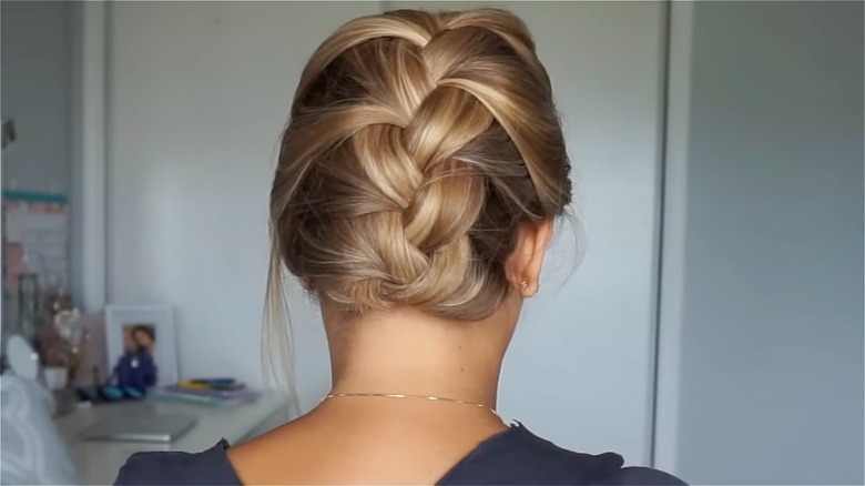 woman with short french braid