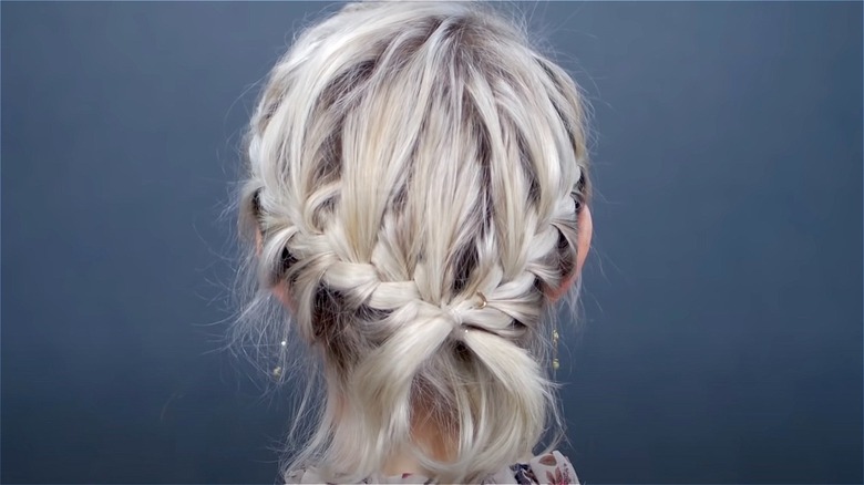 woman wearing short hair in two braids