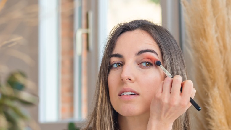 Woman blending eyeshadow