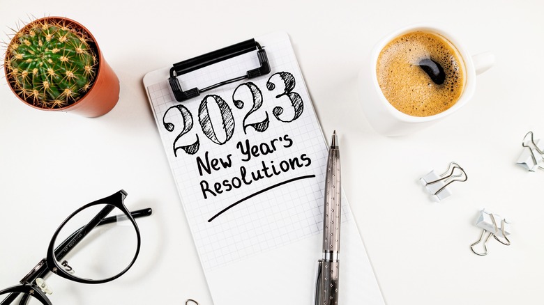 new year's resolutions on clipboard