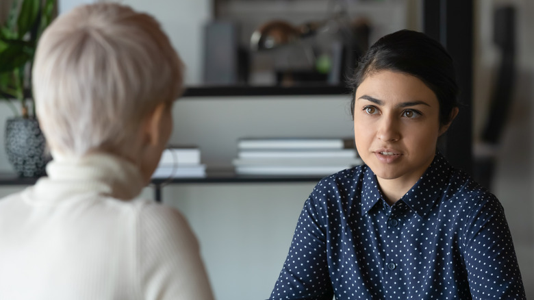 woman talking to Human Resources