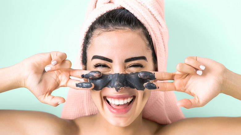 A woman with exfoliating face mask