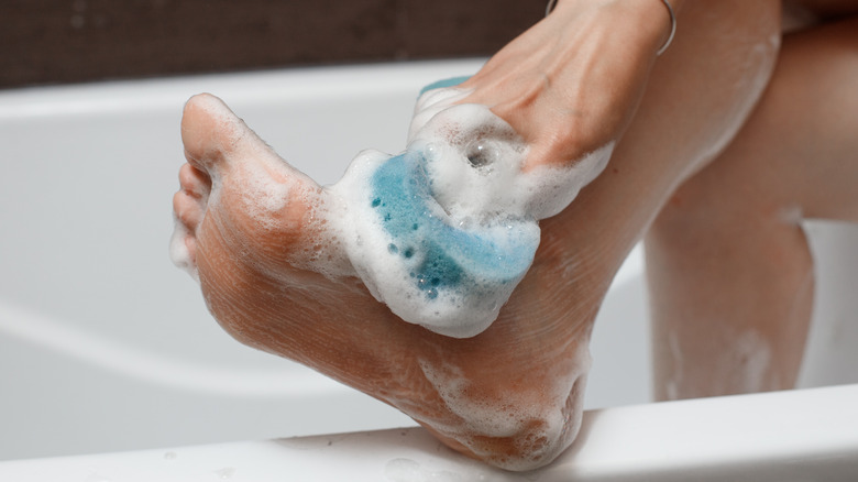 A woman washing her feet