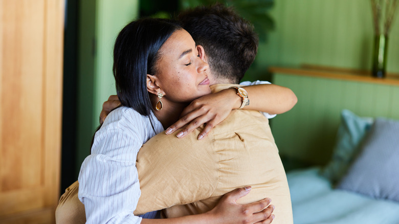 couple hugging each other