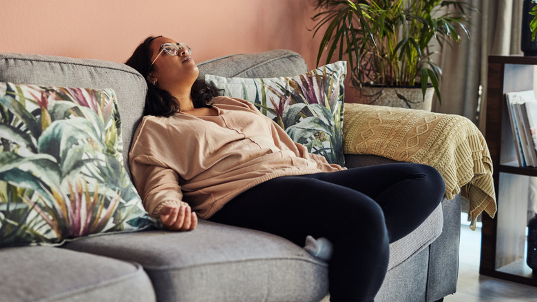 stressed woman on sofa