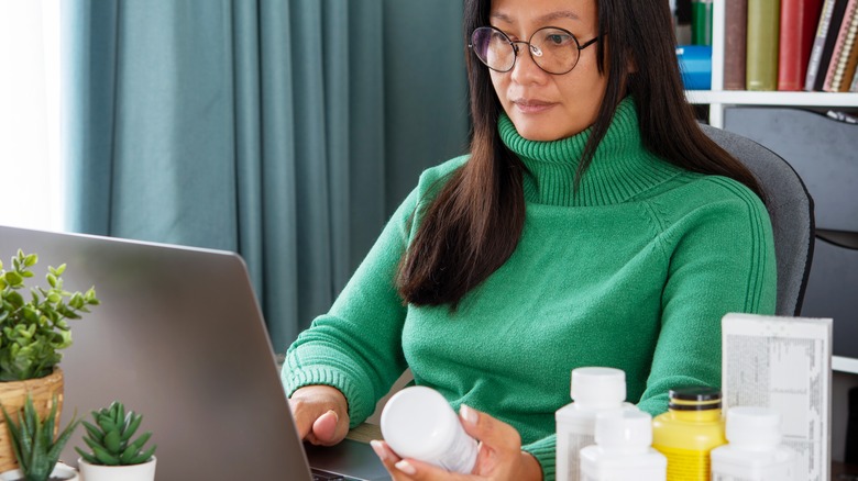 woman holding a product