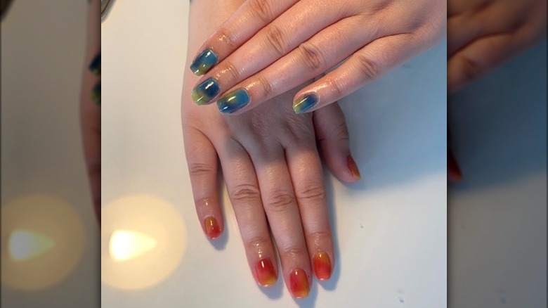 Jewel-toned eyeshadow nails 