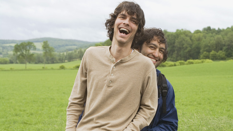 two men smiling