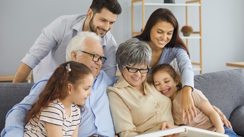 family looking at photos