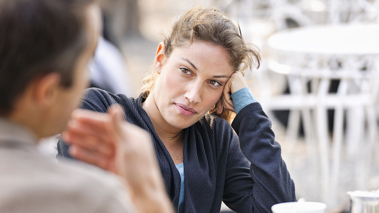 woman listening to man