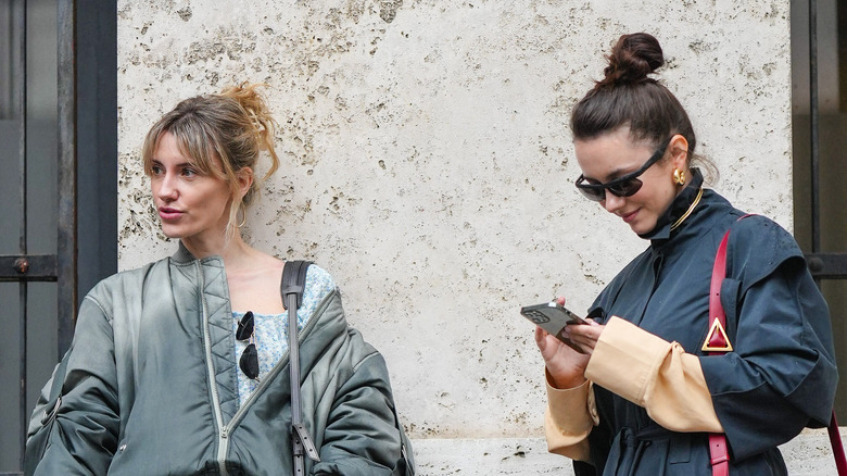 Two women with hair up 