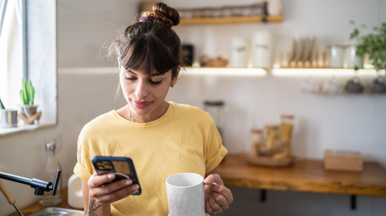 woman using smartphone