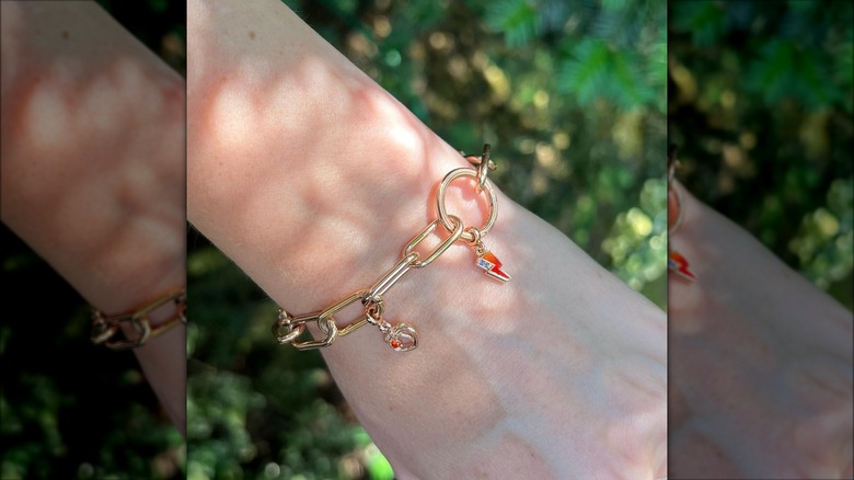 charm bracelet on a wrist