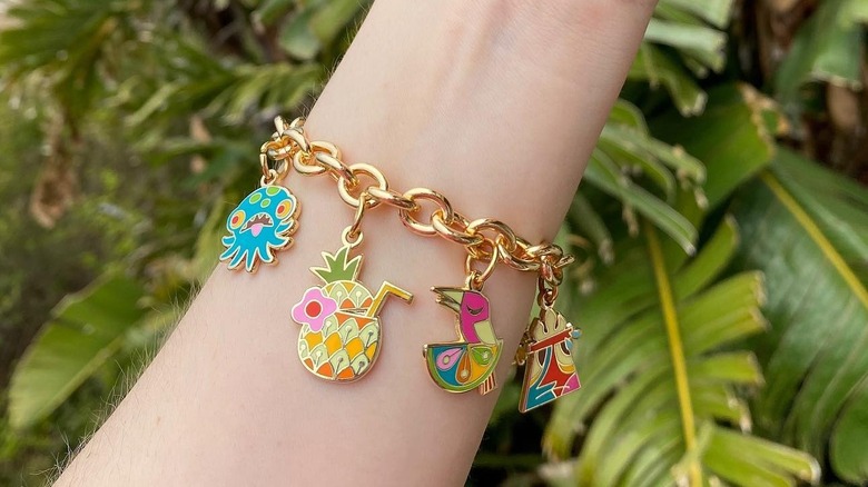 tropical charm bracelet on a wrist