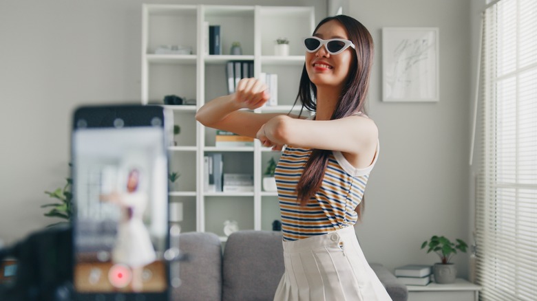 woman dancing in selfie video